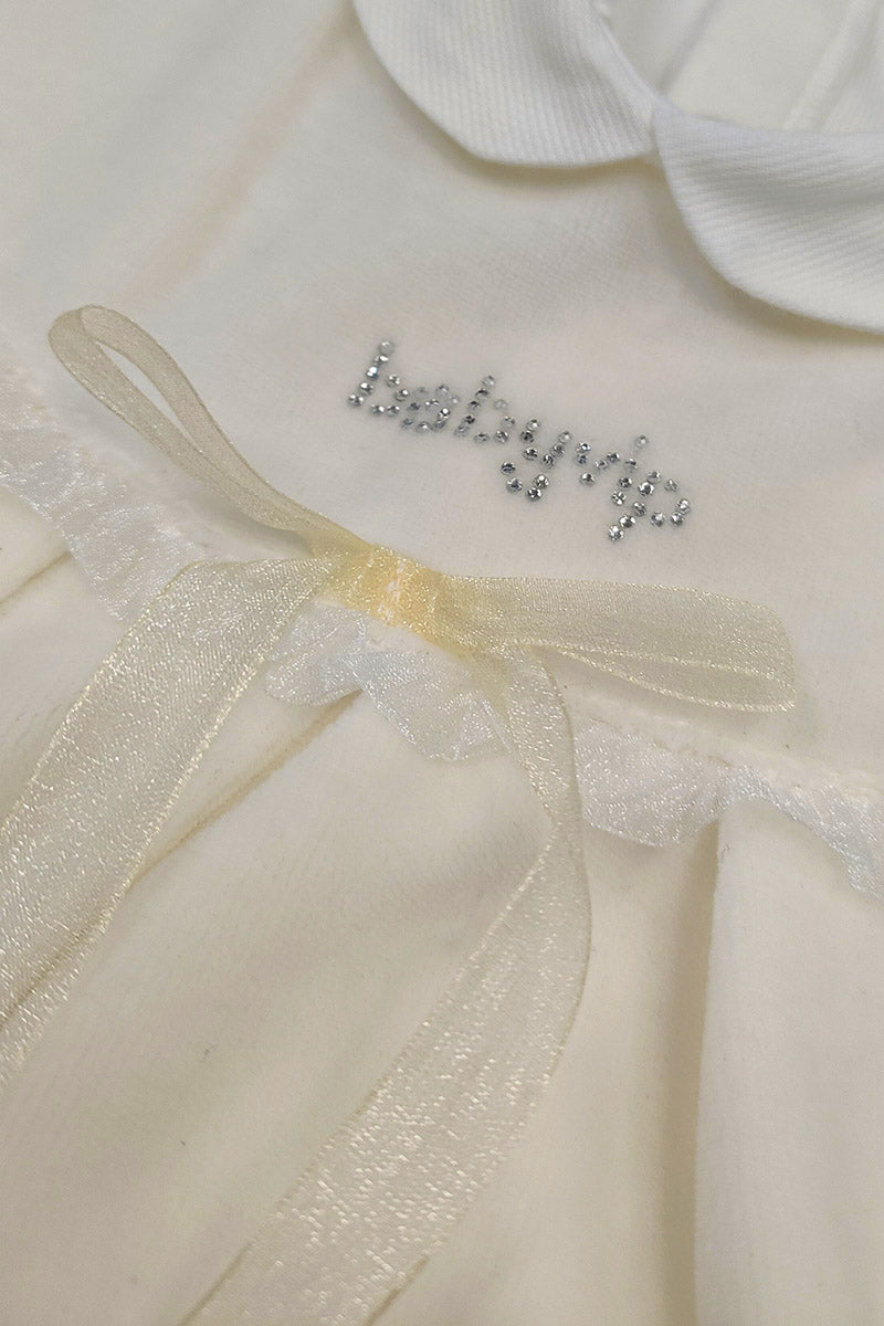 Tutina in ciniglia con strass e fiocchetto