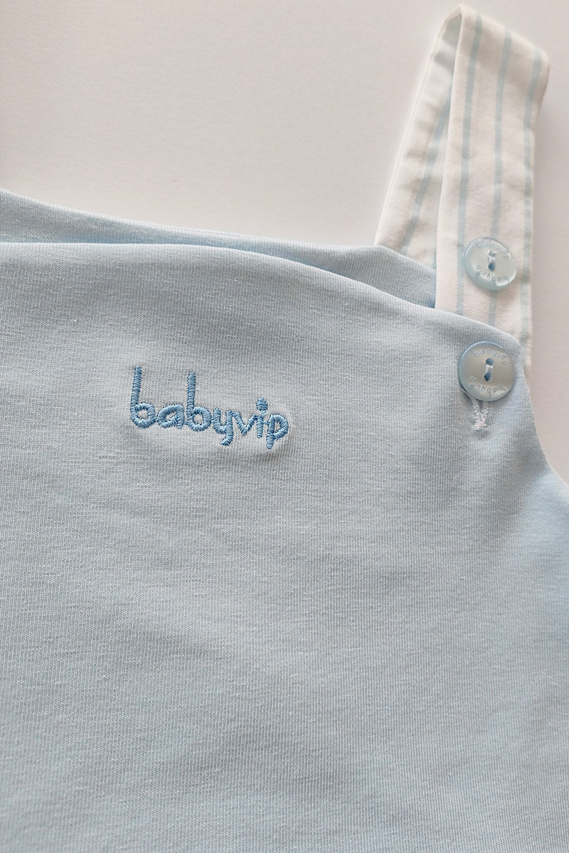 Salopette in cotone elasticizzato rigato con scritta ricamata