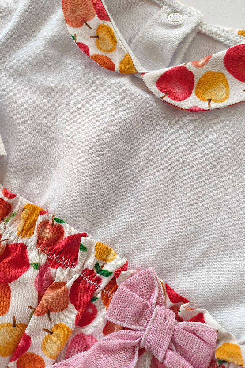 Completo 2 pezzi in cotone elasticizzato con inserti in tela di cotone fantasia mele e fiocco applicato in contrasto