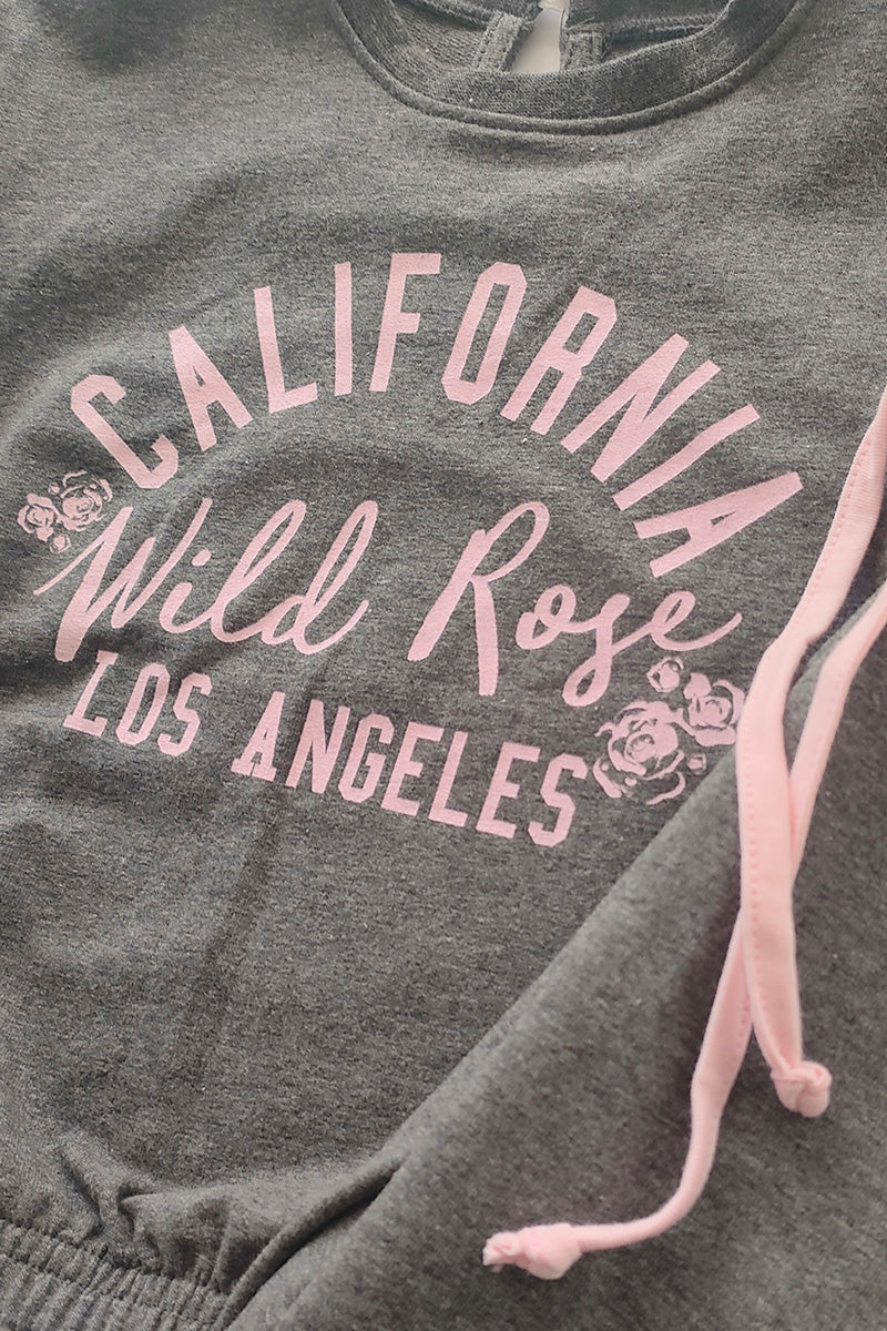 Completo manica lunga in felpina con stampa e balze su maniche - pantalone con fasce laterali