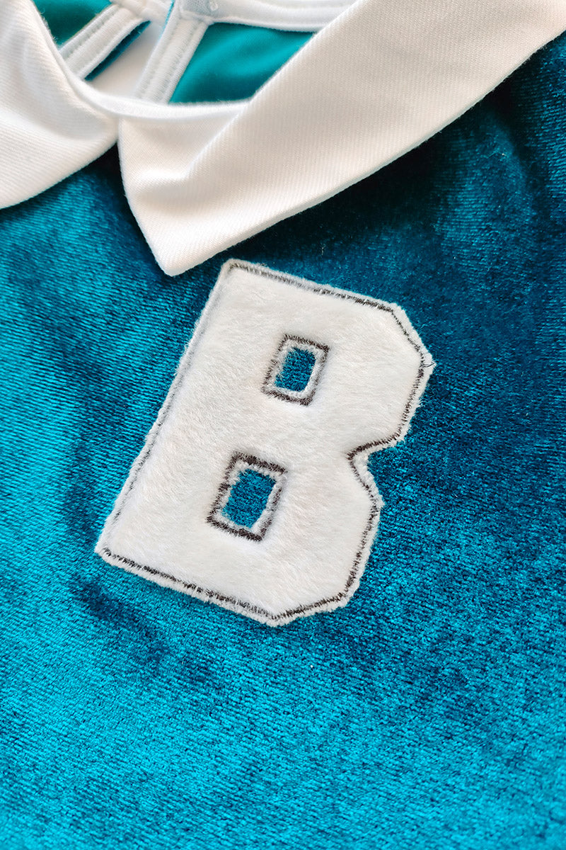 Maglia in velluto con inserti in tela di cotone effetto camicia, ricamo lato cuore con inserto in ecopelliccia