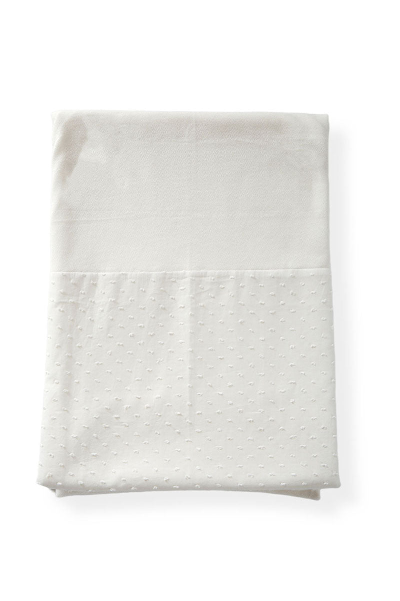 Copertina in piquet con inserto in tela di cotone plumetis