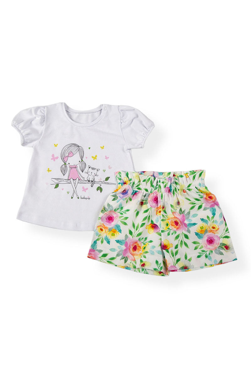 Completo: maglia in cotone elasticizzato con stampa e maniche a sbuffo e pantaloncino in tela di cotone organico fantasia floreale