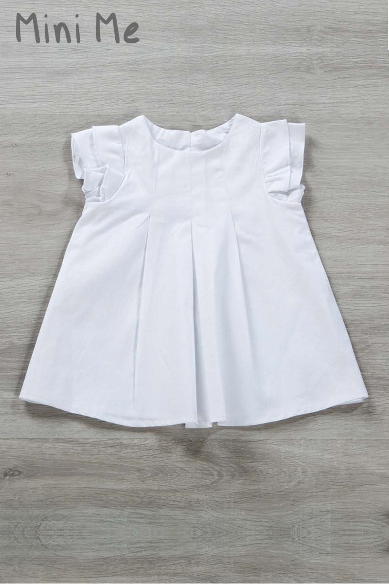 Vestitino neonata in tela di cotone