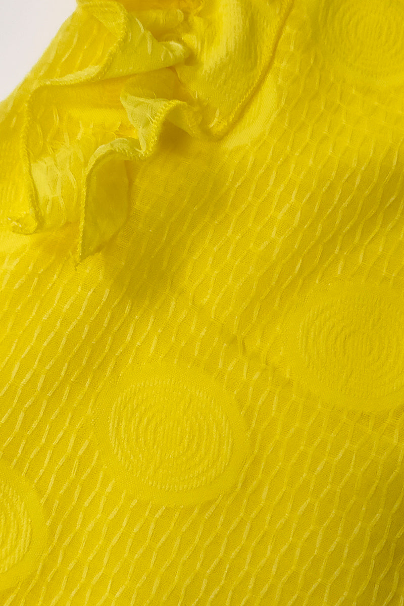 Vestitino smanicato in tela di cotone a fantasia cerchi grande e rousches