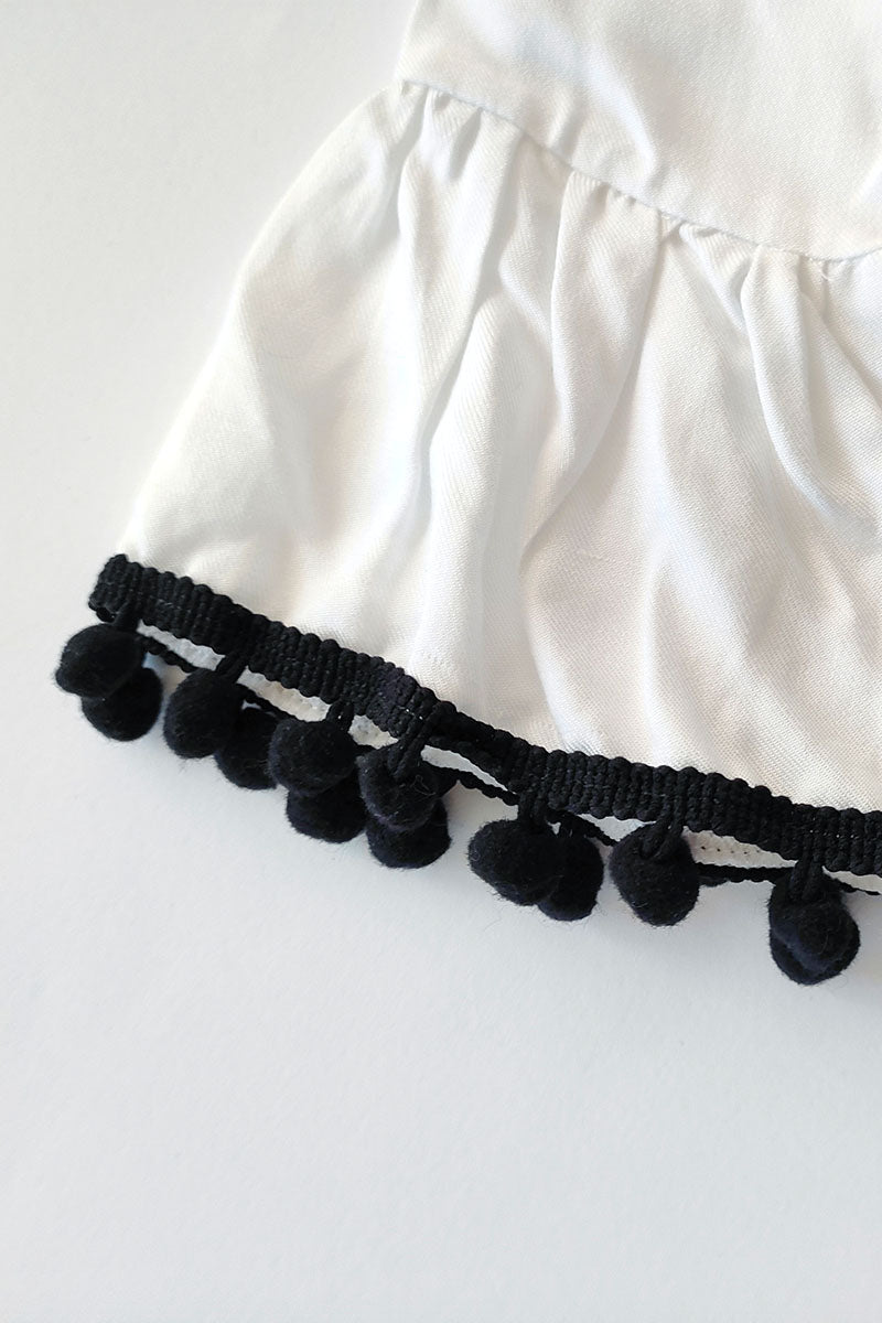 Vestitino smanicato in felpa garzata con balza arricciata + camicia in flanella