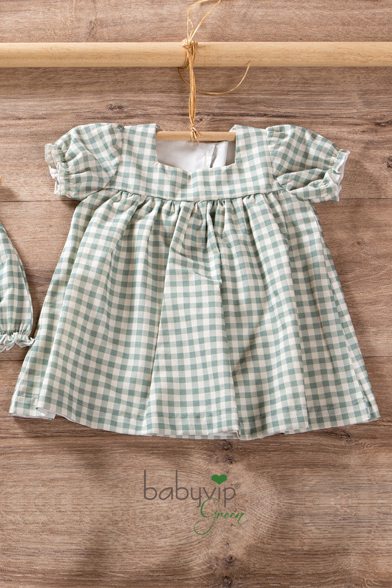 Vestitino neonata in tela di cotone organico con scollo quadro e maniche a palloncino