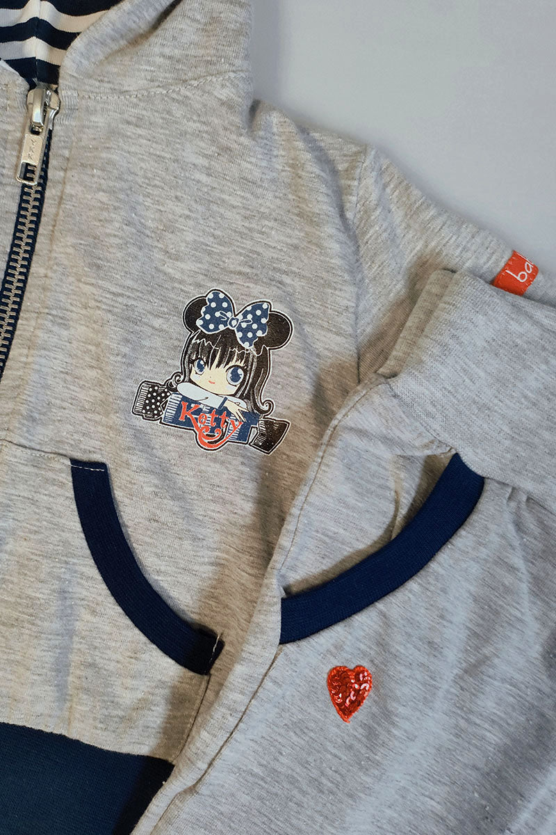Tuta con cappuccio neonata/bimba in cotone elasticizzato con applicazioni e stampa