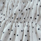 Pagliaccetto spalla stretta neonata con fantasia a  pois in cotone con strass