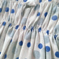 Pagliaccetto spalla stretta neonata con fantasia a  pois in cotone con strass