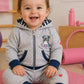 Tuta con cappuccio neonata/bimba in cotone elasticizzato con applicazioni e stampa