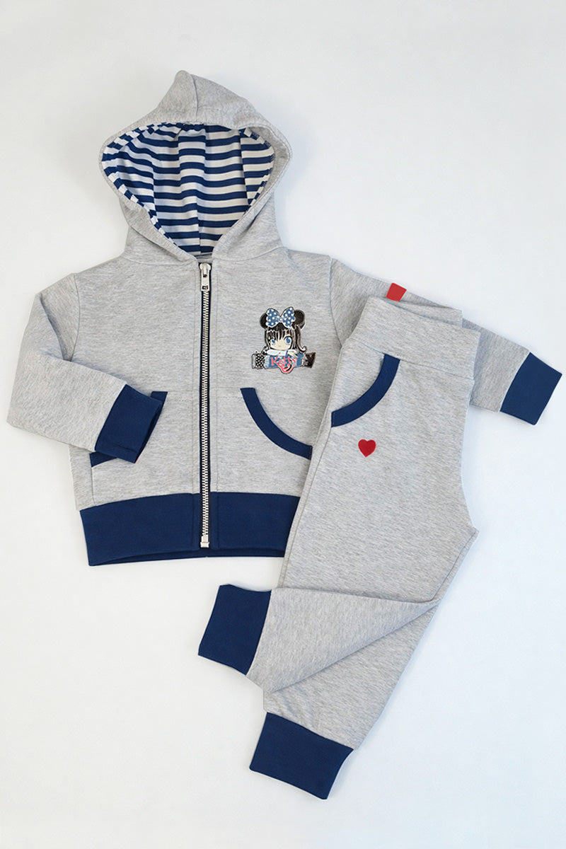 Tuta con cappuccio neonata/bimba in cotone elasticizzato con applicazioni e stampa