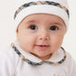 Cappellino in ciniglia con  risvolto e ricamo scritta Babyvip