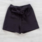 Bermuda bimba in tessuto crepe con cintura