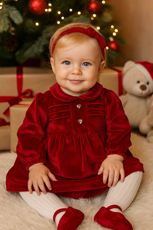 Vestitino in velluto elasticizzato bottoncini in madreperla a forma di cuore taglio con arricciature e maniche a sbuffo