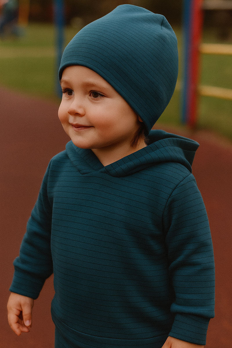 Cappellino in cotone elasticizzato con fantasia rigata