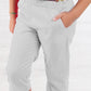 Pantalone modello capri in tela di cotone con tasche e spacchetti sul fondo
