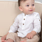 Completo 2 pezzi: Camicia in tela di cotone con collo coreana, fenda e bottoncini in contrasto + pantalone modello morbido con coulisse e tasche