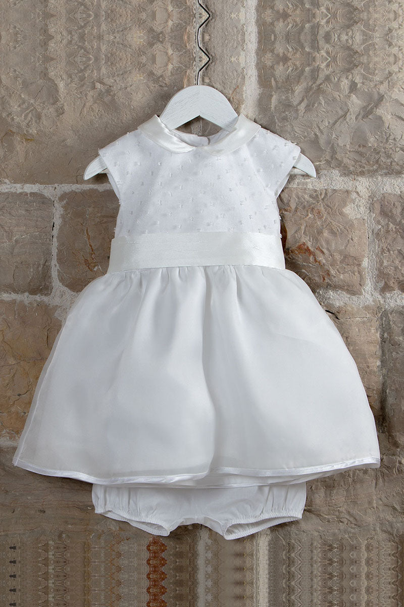 Vestitino in tela di cotone con inserto organza con pois in rilievo cintura in tessuto annodabile sul retro con fiocco