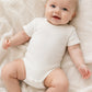 Body neonato in cotone a mezza manica