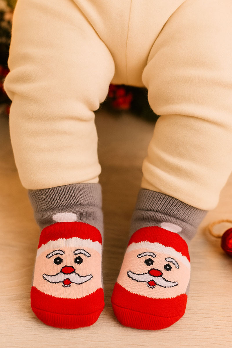 Calzino in spugna con applicazione antiscivolo fantasia natale