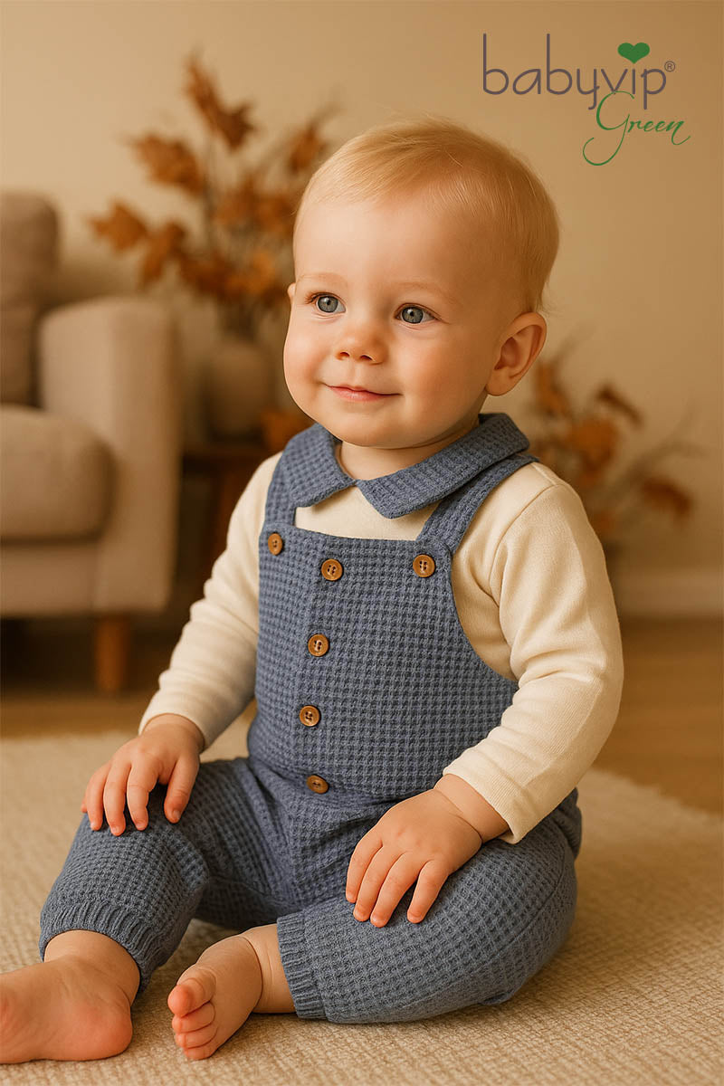 Salopette in cotone organico a nido d’ape con bottoncini in contrasto ed elastico sul fondo