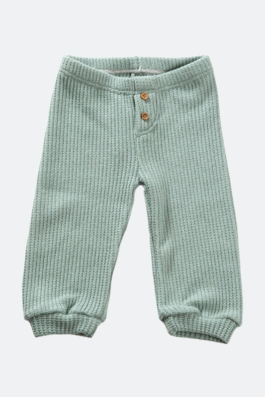 Pantalone in tessuto a maglia con bottoncini in contrasto