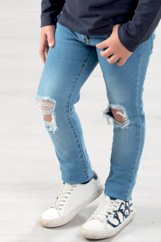 Jeans bimbo strappati con abrasioni