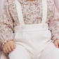 Completo 2 pezzi : Pantalone in velluto con bretelle + body a camicia fantasia