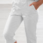 Pantalone modello Capri con tasche e spacchetti sul fondo