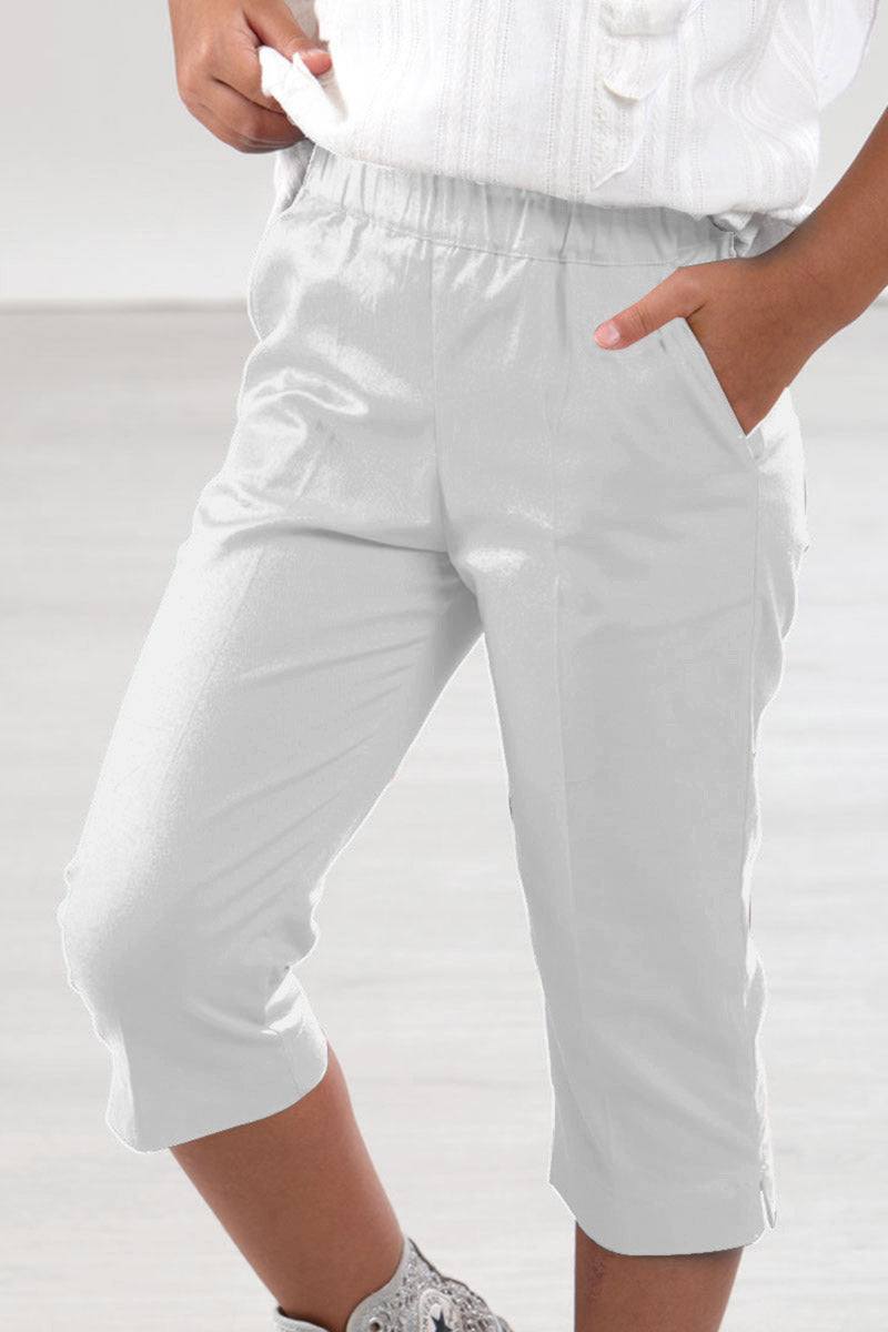 Pantalone modello Capri con tasche e spacchetti sul fondo