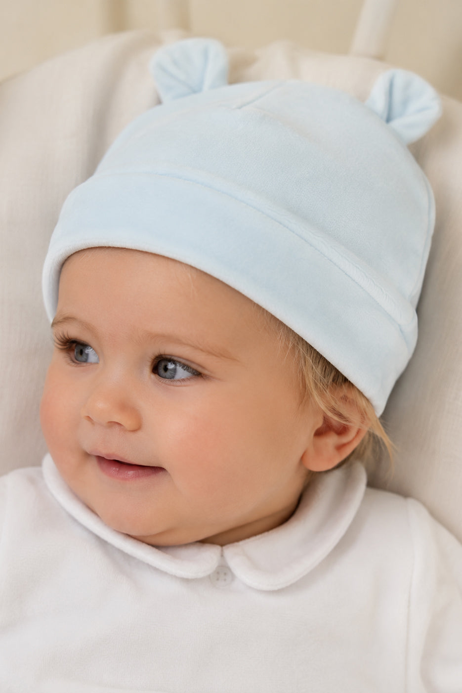Cappellino in ciniglia con orecchie