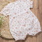 Pagliaccetto neonata in tela di cotone organico