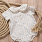 Pagliaccetto neonato in mussola di cotone organico